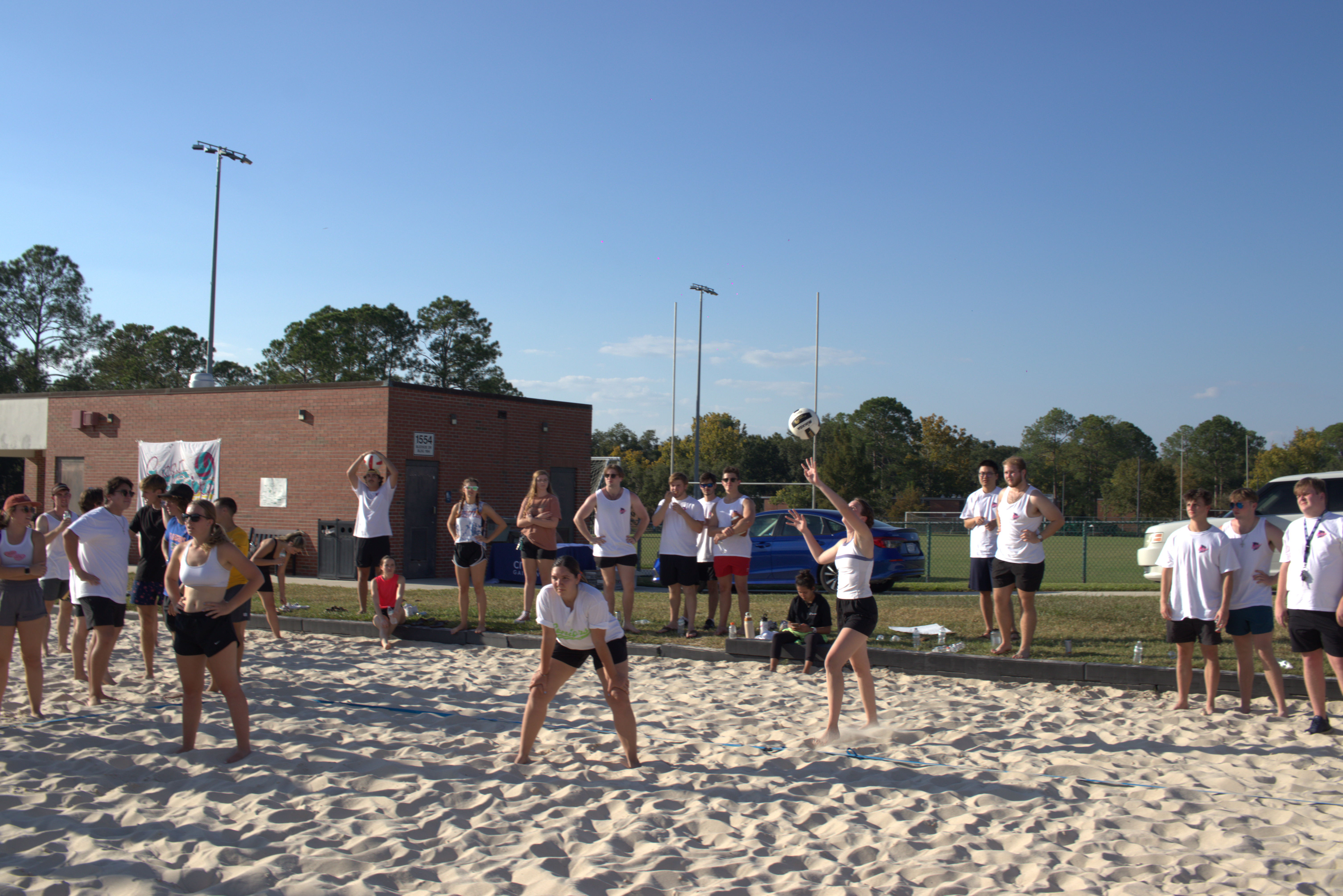 Teams playing volleyball at Sugar and Spike